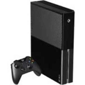A black gaming console with a matching wireless controller placed beside it. The console has a sleek, rectangular design with a disc drive on the front.